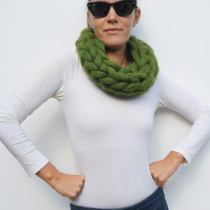 girl wearing a willow olive green chunky knit infinity cowl merino wool scarf