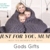 Gift certificate for mother's day picturing a mother hugging her young boys wrapped around with a chunky knit granite grey merino wool blanket handmade by Gods Gifts Boutique